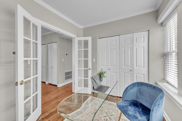 1438 W Roscoe St Unit 3, Chicago, IL 60657 - sitting room featuring french doors, ornamental molding, and wood finished floors