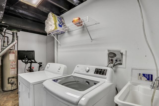 1157 Dartmouth Ln, Deerfield, IL 60015 - laundry room featuring gas water heater, washer and dryer, and stone finish flooring