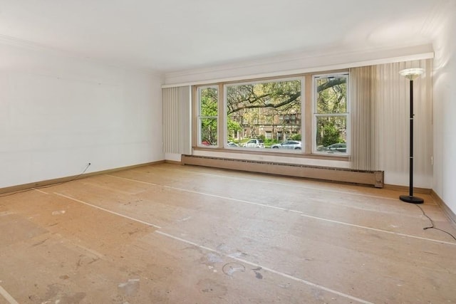 1214 Hull Ter, Evanston, IL 60202 - empty room featuring a baseboard radiator and crown molding