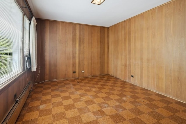 1214 Hull Ter, Evanston, IL 60202 - spare room featuring wood walls
