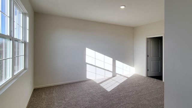 6467 Juniper Dr, Wonder Lake, IL 60097 - carpeted empty room featuring plenty of natural light, baseboards, and recessed lighting