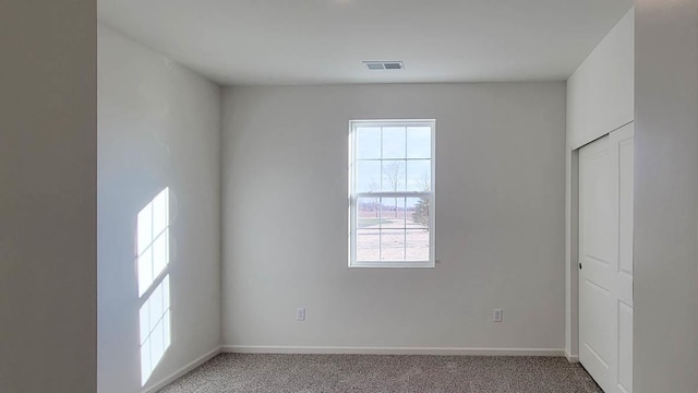 6467 Juniper Dr, Wonder Lake, IL 60097 - unfurnished room with light carpet and baseboards