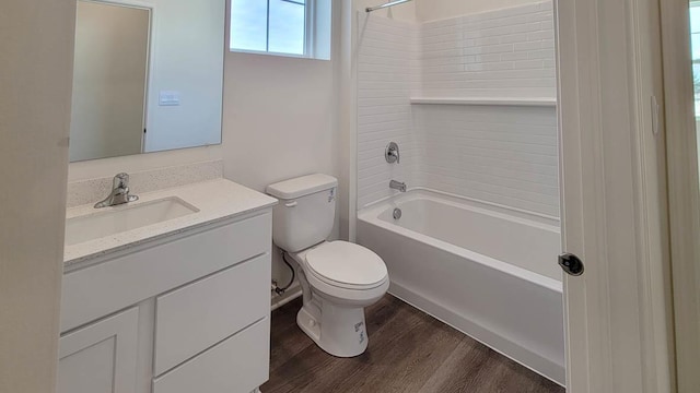 6467 Juniper Dr, Wonder Lake, IL 60097 - bathroom featuring wood finished floors, toilet, vanity, and tub / shower combination
