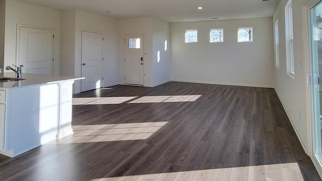 6467 Juniper Dr, Wonder Lake, IL 60097 - entrance foyer with dark wood finished floors, baseboards, and recessed lighting