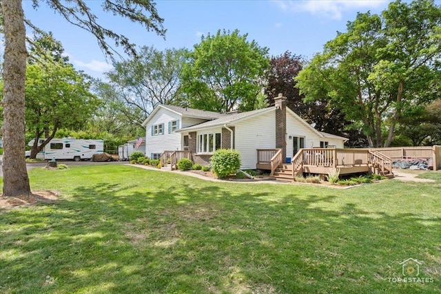 120 3 Oaks Rd, Cary, IL 60013 - back of house with a chimney, a wooden deck, and brick siding