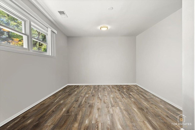 120 3 Oaks Rd, Cary, IL 60013 - spare room featuring wood finished floors and baseboards