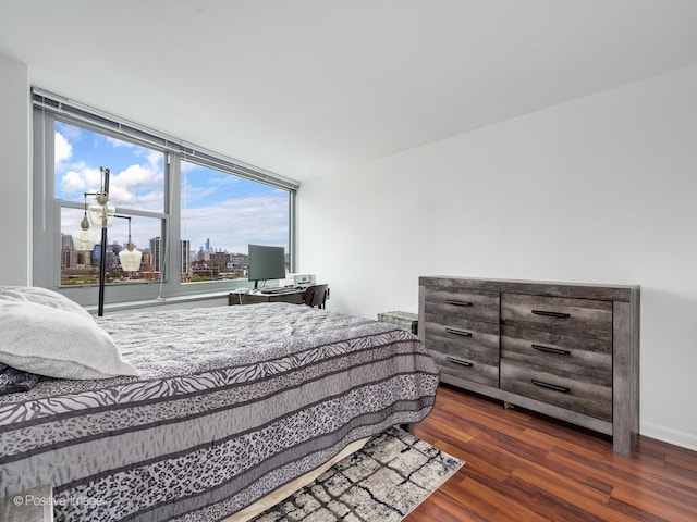 555 W Cornelia Ave Unit 1405, Chicago, IL 60657 - bedroom featuring wood finished floors and multiple windows