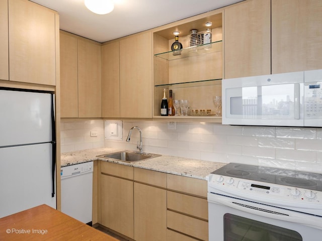555 W Cornelia Ave Unit 1405, Chicago, IL 60657 - kitchen featuring white appliances, a sink, light brown cabinets, and open shelves