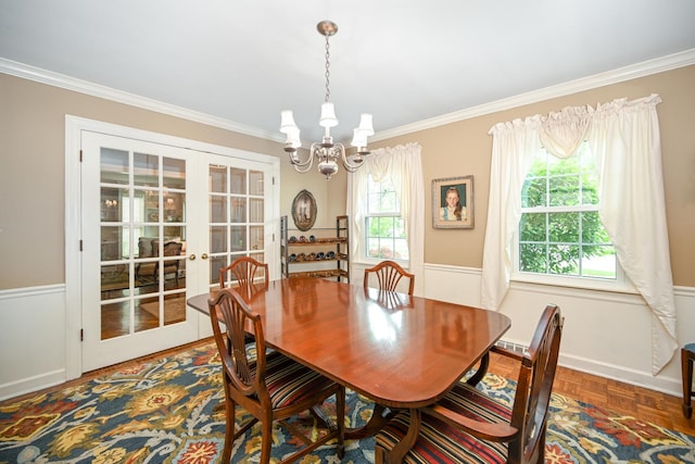 25W651 Towpath Ct, Wheaton, IL 60189 - dining space with french doors, crown molding, and a chandelier