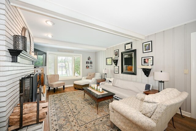 25W651 Towpath Ct, Wheaton, IL 60189 - living area with beam ceiling, wood finished floors, a brick fireplace, crown molding, and baseboards