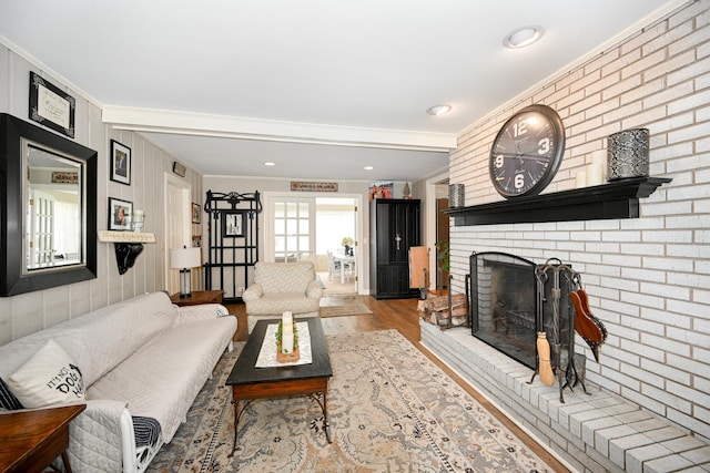 25W651 Towpath Ct, Wheaton, IL 60189 - living area featuring ornamental molding, wood finished floors, and a fireplace