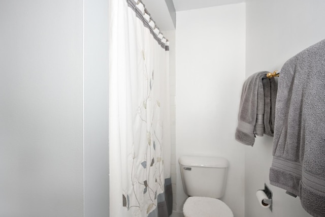 25W651 Towpath Ct, Wheaton, IL 60189 - bathroom with toilet and a shower with shower curtain