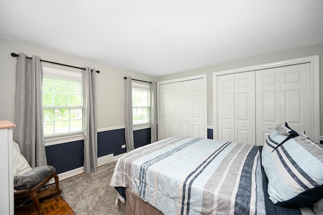 25W651 Towpath Ct, Wheaton, IL 60189 - bedroom featuring multiple closets and baseboards