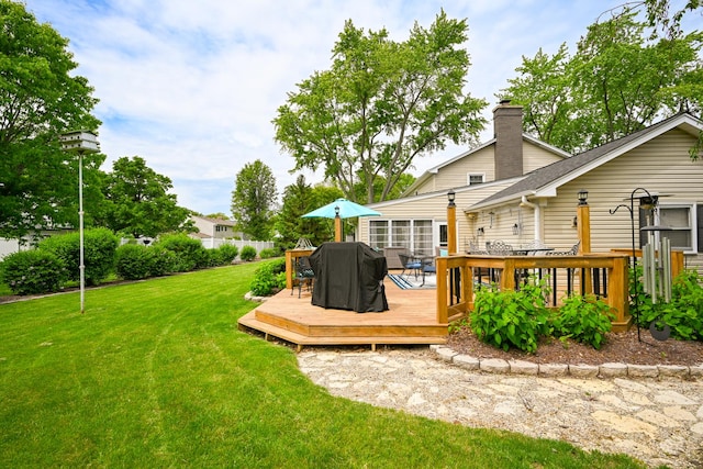25W651 Towpath Ct, Wheaton, IL 60189 - view of grassy yard with a wooden deck and outdoor dining area