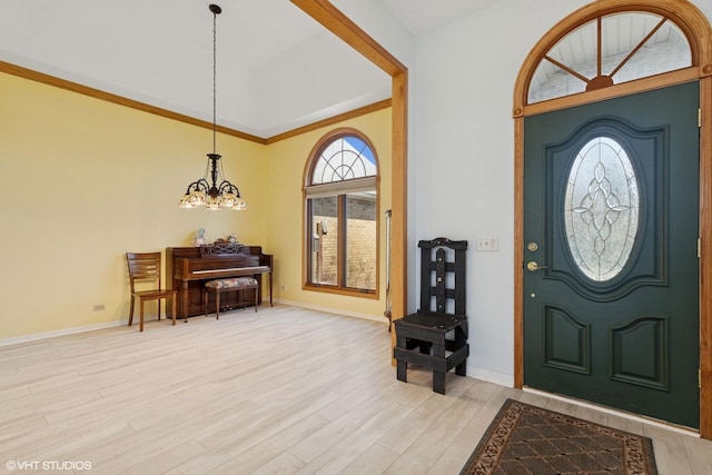 6719 W Applewood Ln, Spring Grove, IL 60081 - foyer featuring light wood finished floors, baseboards, and a chandelier