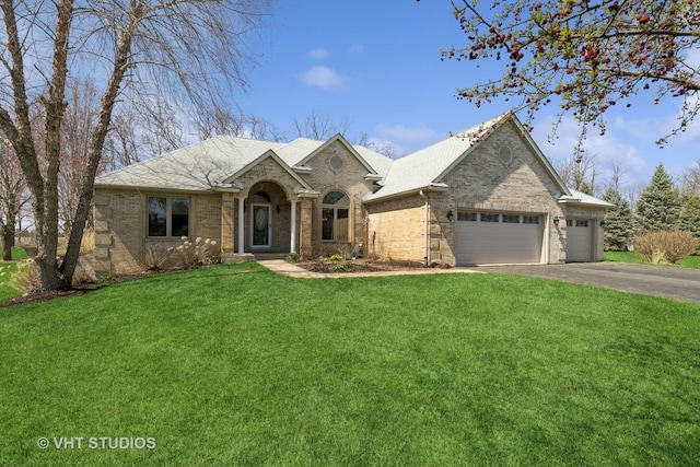 6719 W Applewood Ln, Spring Grove, IL 60081 - foyer with light wood-type flooring, a chandelier, and baseboards