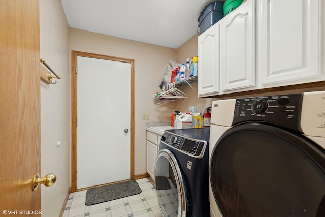 6719 W Applewood Ln, Spring Grove, IL 60081 - laundry room featuring separate washer and dryer, cabinet space, light floors, and baseboards
