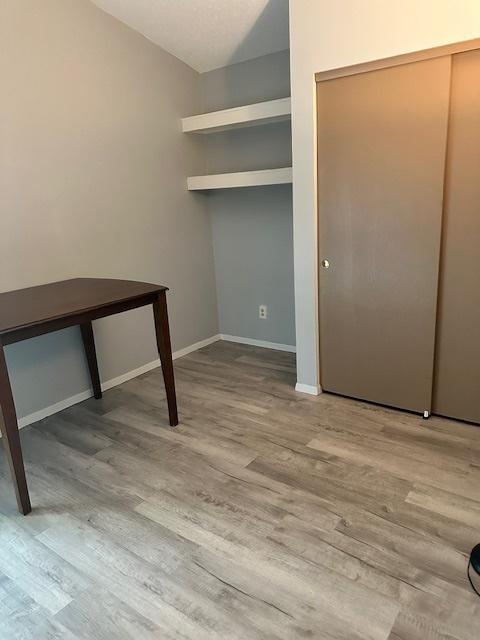 2302 Melrose Dr Unit A, Champaign, IL 61820 - washroom with wood finished floors and baseboards