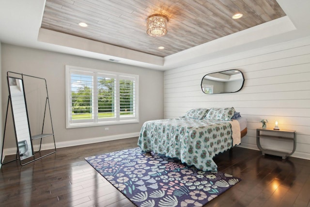 16829 Sheridans Trl, Orland Park, IL 60467 - bedroom featuring a raised ceiling, wood-type flooring, baseboards, wood ceiling, and wooden walls
