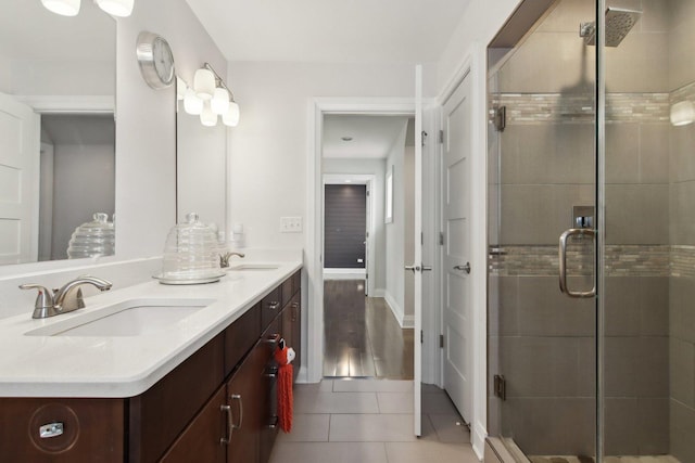 16829 Sheridans Trl, Orland Park, IL 60467 - bathroom featuring double vanity, a stall shower, and tile patterned flooring