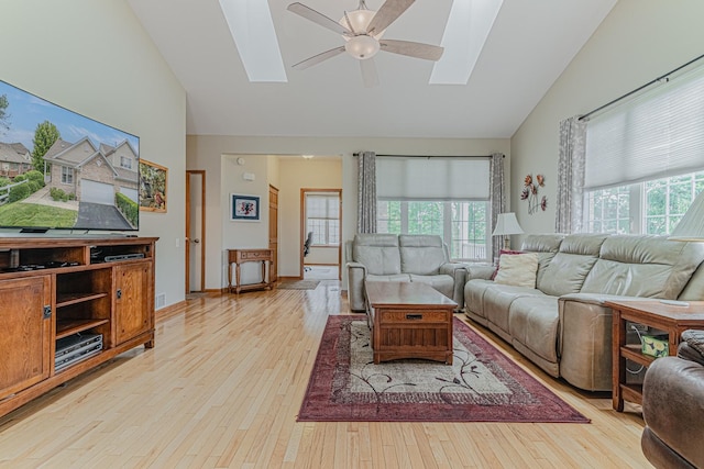 11656 Lake Shore Dr, Orland Park, IL 60467 - living room with a skylight, ceiling fan, healthy amount of natural light, and high vaulted ceiling