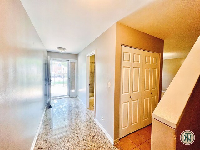 4532 S Woodlawn Ave, Chicago, IL 60653 - hallway with baseboards and granite floors