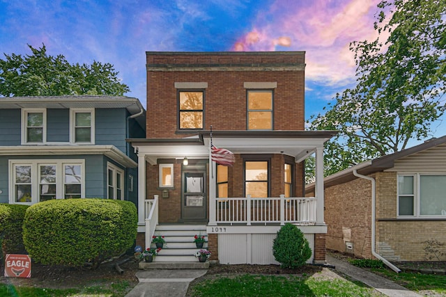 1044 S E Ave, Oak Park, IL 60304 - view of front of house featuring a porch and brick siding