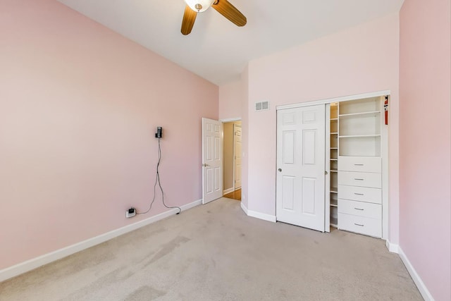 2334 Glen Eagles Ln, Riverwoods, IL 60015 - unfurnished bedroom with carpet, baseboards, a closet, and a ceiling fan