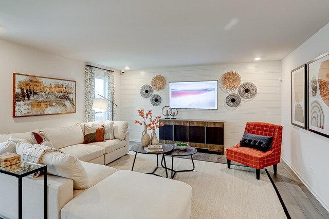 740 Cloverleaf Dr, Marengo, IL 60152 - living area with wood finished floors, recessed lighting, wood walls, and baseboards