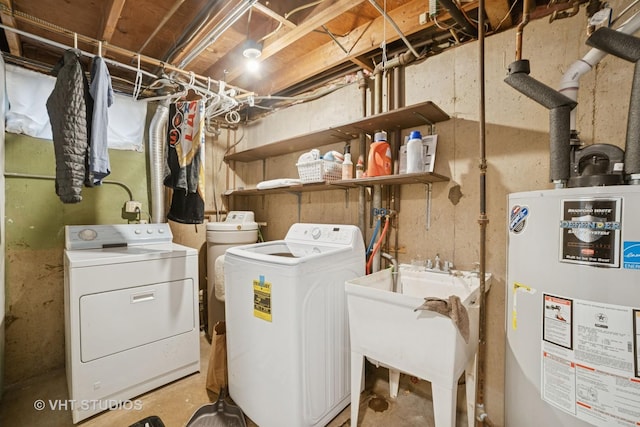 238 1st St, Cary, IL 60013 - laundry area featuring gas water heater and washer and clothes dryer