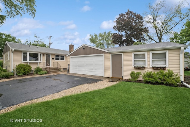 238 1st St, Cary, IL 60013 - single story home with a front yard and a chimney