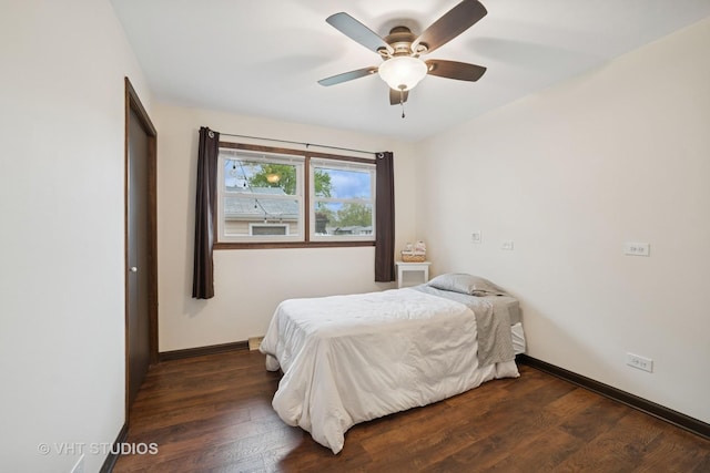 238 1st St, Cary, IL 60013 - bedroom with wood finished floors, baseboards, and ceiling fan