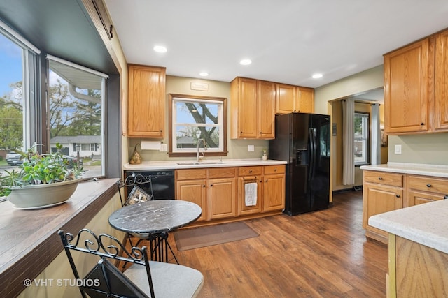 238 1st St, Cary, IL 60013 - kitchen featuring black appliances, a sink, light countertops, dark wood-type flooring, and recessed lighting