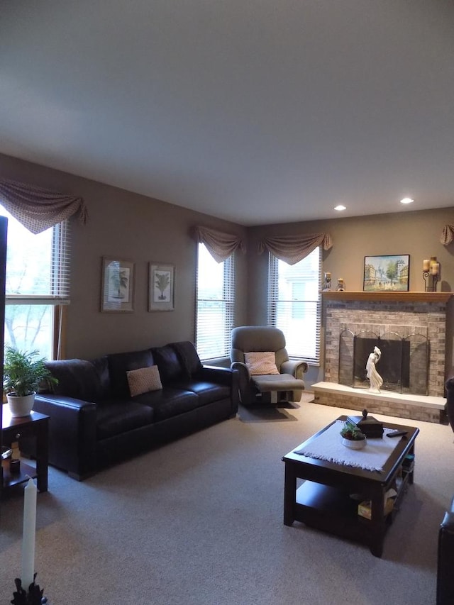 5355 Fox Path Ln, Hoffman Estates, IL 60192 - carpeted living room with a stone fireplace and recessed lighting