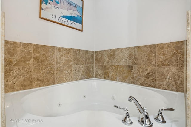 bathroom featuring a whirlpool tub