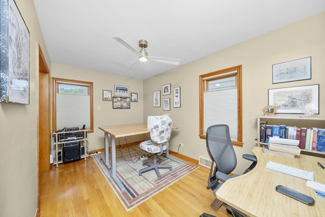 4129 N Mcvicker Ave, Chicago, IL 60634 - office space featuring wood finished floors, ceiling fan, and baseboards