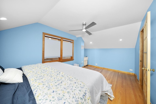 4129 N Mcvicker Ave, Chicago, IL 60634 - bedroom featuring lofted ceiling, light wood-style floors, baseboards, and a ceiling fan