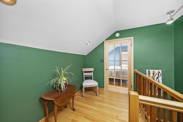 4129 N Mcvicker Ave, Chicago, IL 60634 - sitting room featuring lofted ceiling, wood finished floors, and baseboards