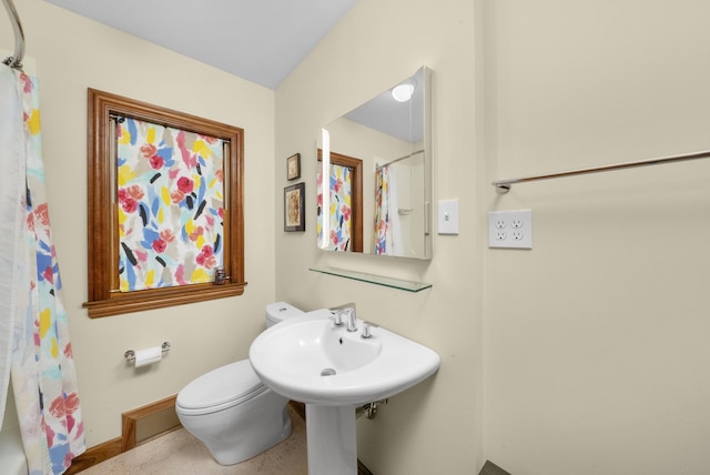 4129 N Mcvicker Ave, Chicago, IL 60634 - bathroom with toilet, a shower with shower curtain, and baseboards