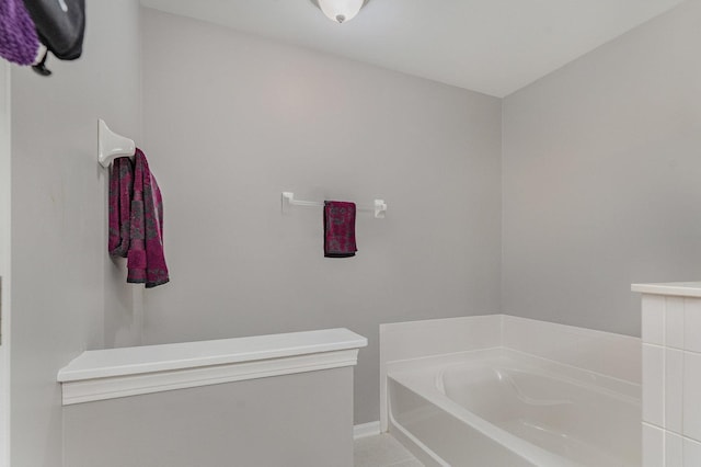 1966 Waverly Way, Montgomery, IL 60538 - full bathroom featuring a garden tub, tile patterned floors, and baseboards