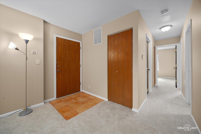 753 Candleridge Ct Unit C1, Bartlett, IL 60103 - foyer entrance featuring light carpet and baseboards