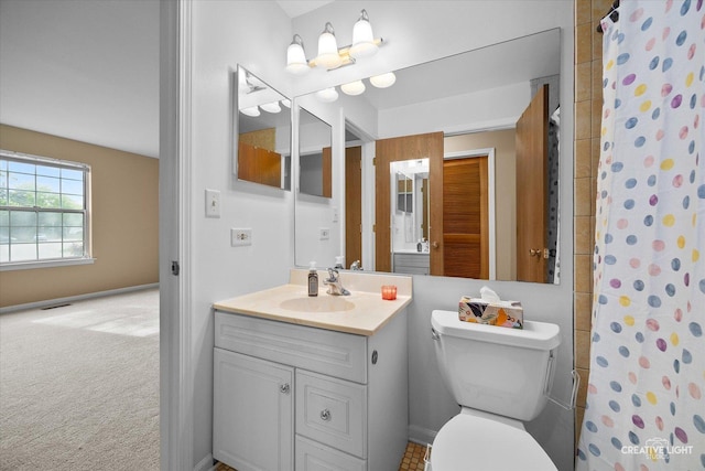 753 Candleridge Ct Unit C1, Bartlett, IL 60103 - bathroom with vanity, toilet, and curtained shower