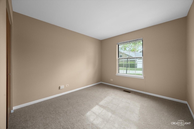 753 Candleridge Ct Unit C1, Bartlett, IL 60103 - empty room with carpet floors and baseboards