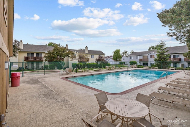753 Candleridge Ct Unit C1, Bartlett, IL 60103 - community pool featuring a residential view, fence, and a patio