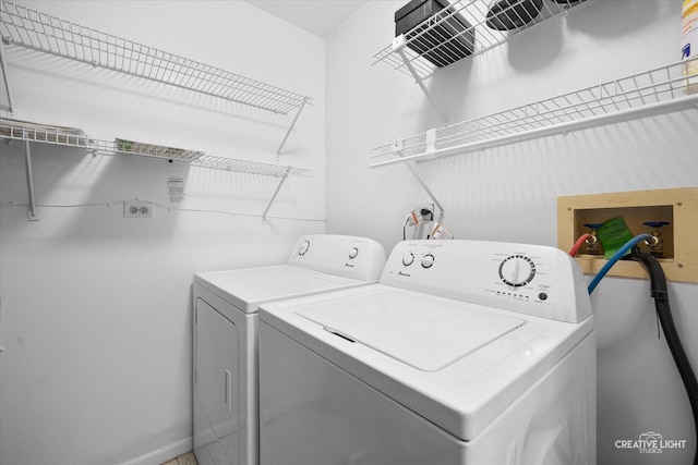 753 Candleridge Ct Unit C1, Bartlett, IL 60103 - washroom with washer and clothes dryer and baseboards