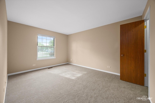 753 Candleridge Ct Unit C1, Bartlett, IL 60103 - carpeted empty room featuring baseboards