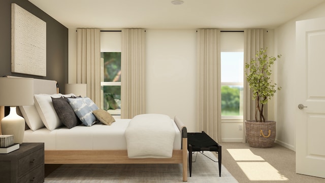 bedroom with baseboards and carpet floors