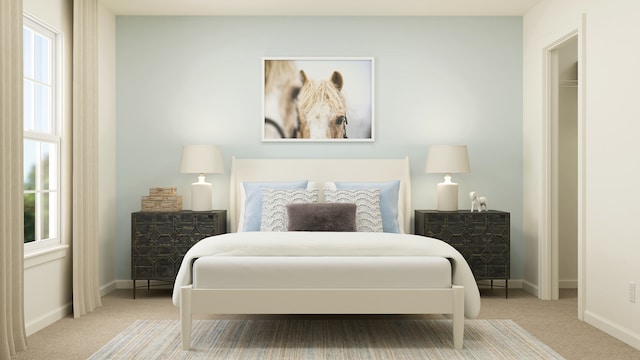 bedroom with carpet floors and baseboards