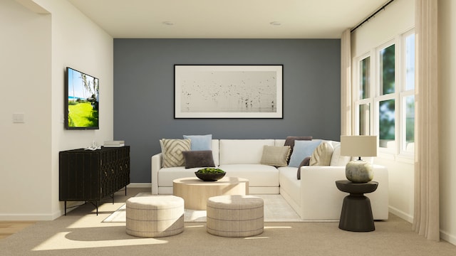 living room with plenty of natural light and baseboards