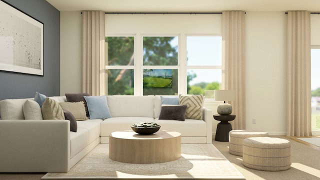 living area with healthy amount of natural light and carpet floors